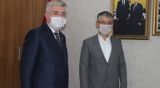 AKP İL BAŞKANI'NDAN MHP'YE HAYIRLI OLSUN ZİYARETİ