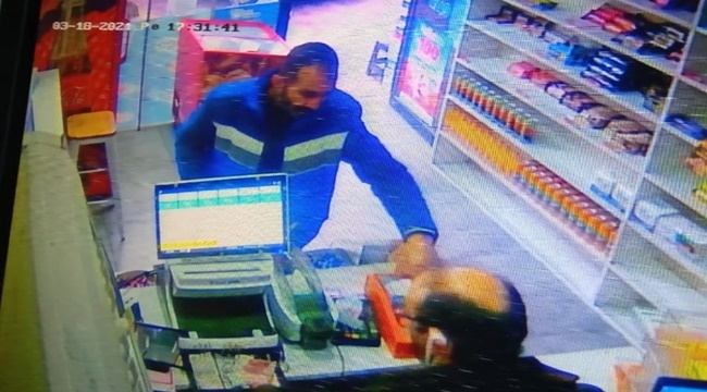 TÜTÜNÜ ÇALAN ZANLI GÜVENLİK KAMERASINA YAKALANDI