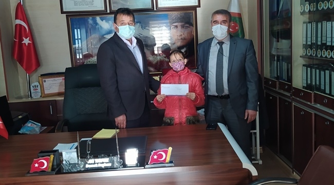 YARIŞMADA BİRİNCİ OLDU, ÖDÜLÜ ŞEHİT AİLELERİNE BAĞIŞLADI