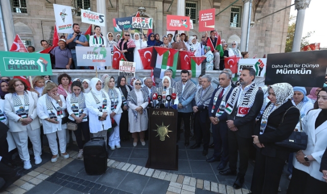 BÜYÜKKILIÇ, EŞİ DR. NECMİYE BÜYÜKKILIÇ İLE BİRLİKTE