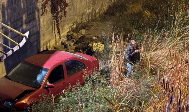 KANALA UÇAN SÜRÜCÜ MERDİVENİ TIRMANARAK ÇIKTI